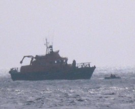 Литовцы в лодке посреди Ла-Манша.